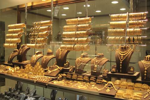 Rows of gold bangles and necklace sets in a jeweller’s window at the Grand Bazaar, Istanbul